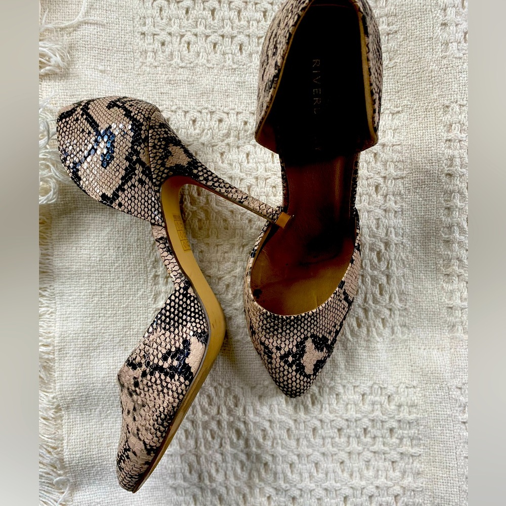 Faux snake skin side cut heels.